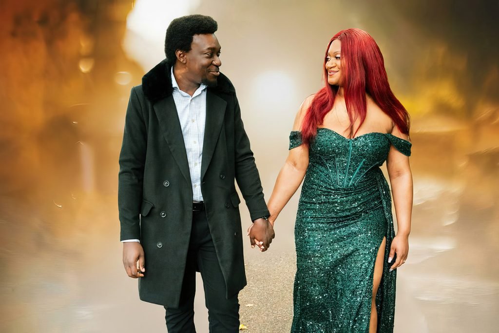 Couple holding hands in elegant attire.